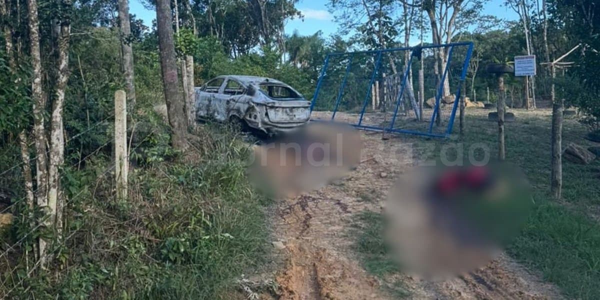 URGENTE: Dupla é executada a tiros e corpos são encontrados ao lado de carro carbonizado na Grande Florianópolis